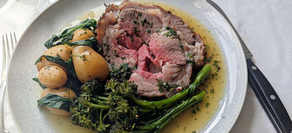HERB CRUSTED SADDLE OF LAMB WITH WHITE WINE & MINT SAUCE